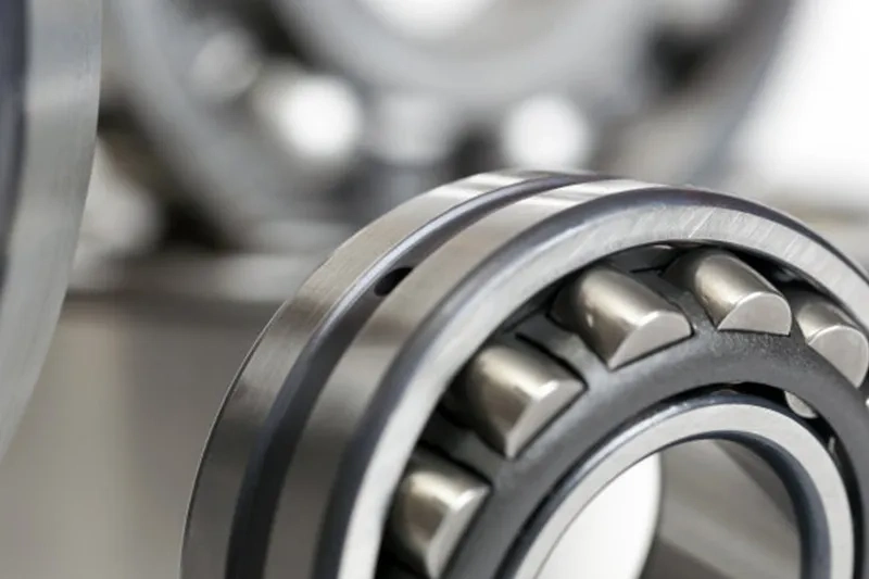 What are the main factors that affect bearing lubricants during operation?